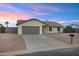 Charming home exterior with manicured front yard and driveway at 6441 E Julep St, Mesa, AZ 85205
