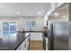 Modern kitchen with stainless steel appliances and ample countertop space at 6441 E Julep St, Mesa, AZ 85205