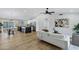 Bright open-concept living space with kitchen island and updated fixtures at 6441 E Julep St, Mesa, AZ 85205