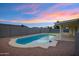 Enjoy this sparkling pool and freshly updated backyard, perfect for relaxing and entertaining outdoors at 6441 E Julep St, Mesa, AZ 85205