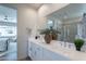 Bathroom showcasing a double vanity, a glass shower and a decorative vase at 670 W Laredo St, Chandler, AZ 85225
