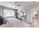 Spacious main bedroom featuring hardwood floors, large mirror, and neutral colors at 670 W Laredo St, Chandler, AZ 85225