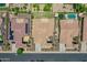 Aerial view of a neighborhood, featuring homes with well-maintained yards and close access to community park at 6914 W Juana Dr, Peoria, AZ 85383
