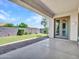 Back patio featuring a view of the backyard with mature landscaping and privacy wall at 6914 W Juana Dr, Peoria, AZ 85383