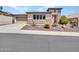 Charming single-Gathering home with stone accents, low maintenance landscaping, and a two car garage at 6914 W Juana Dr, Peoria, AZ 85383