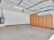 Garage features epoxy flooring, built-in storage cabinets and water heater at 6914 W Juana Dr, Peoria, AZ 85383