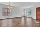 Bright and airy living room with tile floors, large windows, and natural light at 6914 W Juana Dr, Peoria, AZ 85383