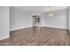 Inviting living room area with tile flooring and contemporary chandelier at 6914 W Juana Dr, Peoria, AZ 85383