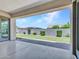 Covered patio area featuring a view of the backyard with mature landscaping and privacy wall at 6914 W Juana Dr, Peoria, AZ 85383