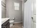 This bathroom features a vanity sink, a toilet, and a curtained shower at 7216 N 124Th Ln, Glendale, AZ 85307