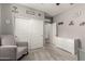 Neutral-toned bedroom with a sliding door closet and decor accents for visual appeal at 7216 N 124Th Ln, Glendale, AZ 85307