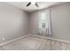 Bedroom featuring neutral colored walls, carpet, ceiling fan and a window at 7216 N 124Th Ln, Glendale, AZ 85307