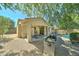Backyard featuring patio, built-in grill, and pool at 7815 S 22Nd Ln, Phoenix, AZ 85041