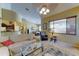 Bright and airy living room with views into the dining area and breakfast bar, ideal for modern living at 7815 S 22Nd Ln, Phoenix, AZ 85041