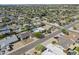 A well-maintained neighborhood featuring mature trees and landscaping, close to local amenities and parks at 8307 E Buena Terra Way, Scottsdale, AZ 85250