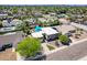 Expansive aerial view showcasing the home, lush surroundings, neighborhood, and desert landscaping, perfect for outdoor enjoyment at 8307 E Buena Terra Way, Scottsdale, AZ 85250