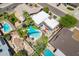 Wide aerial view showcases a home with a private backyard oasis, pool, and desert landscaping, offering a serene retreat at 8307 E Buena Terra Way, Scottsdale, AZ 85250
