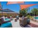 Relaxing backyard featuring a pool, a lounge area, and privacy landscaping at 8307 E Buena Terra Way, Scottsdale, AZ 85250