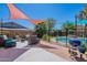 Inviting backyard with a pool, a patio with lounge area, and privacy fencing at 8307 E Buena Terra Way, Scottsdale, AZ 85250