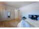 Bright bedroom featuring closet space, bed, and a window with views at 8307 E Buena Terra Way, Scottsdale, AZ 85250