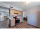 Spacious kitchen featuring stainless steel appliances and views into adjacent rooms at 8307 E Buena Terra Way, Scottsdale, AZ 85250
