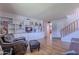 Inviting living room featuring custom built-ins, hardwood floors, and a comfortable seating area at 8307 E Buena Terra Way, Scottsdale, AZ 85250