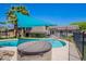 Sparkling pool and spa with covered hot tub, offering a luxurious and refreshing escape in a private backyard setting at 8307 E Buena Terra Way, Scottsdale, AZ 85250