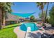 Sparkling backyard pool with diving board, perfect for enjoying outdoor recreation and relaxation in a private setting at 8307 E Buena Terra Way, Scottsdale, AZ 85250