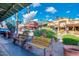 Charming street view of 'Bischoff's Shades of the West' building, benches, and landscaping at 8307 E Buena Terra Way, Scottsdale, AZ 85250