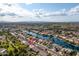 Scenic aerial view of residential homes along the canal, reflecting the serene community setting at 835 W Beechnut Dr, Chandler, AZ 85248