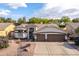 Charming single-Gathering home featuring a tile roof, well-manicured landscaping, and a two car garage at 835 W Beechnut Dr, Chandler, AZ 85248