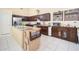 Gourmet kitchen features stainless steel appliances, granite countertops, and custom cabinetry at 835 W Beechnut Dr, Chandler, AZ 85248