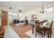 Bright and airy living room with an open floor plan, a dining area, and large windows offering ample natural light at 835 W Beechnut Dr, Chandler, AZ 85248
