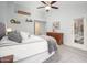 Bright main bedroom with ample natural light, ceiling fan, and stylish decor at 835 W Beechnut Dr, Chandler, AZ 85248