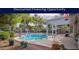 Backyard view featuring a sparkling pool, lush landscaping, patio with pergola and outdoor seating at 835 W Beechnut Dr, Chandler, AZ 85248