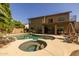 This spacious backyard includes a sparkling pool and spa with a private patio, perfect for outdoor entertaining at 9708 E Pampa Ave, Mesa, AZ 85212