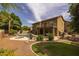 Spacious backyard with a pool, patio, seating area, grill and lush landscaping at 9708 E Pampa Ave, Mesa, AZ 85212