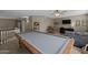 Upper level game room with pool table and sitting area and view of the upper hallway at 9708 E Pampa Ave, Mesa, AZ 85212
