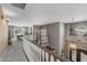 Hallway view showcases the upper level with a view of the staircase and lighting at 9708 E Pampa Ave, Mesa, AZ 85212