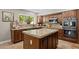 Kitchen featuring a large island and granite countertops at 9708 E Pampa Ave, Mesa, AZ 85212