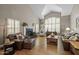 Inviting living room featuring a fireplace, wood floors and vaulted ceilings at 9708 E Pampa Ave, Mesa, AZ 85212