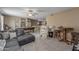 Spacious living area features a comfortable sofa, a pool table, and stylish decor at 9708 E Pampa Ave, Mesa, AZ 85212
