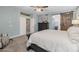 The Main bedroom has light blue walls and a dark bedroom set with a large bed at 9708 E Pampa Ave, Mesa, AZ 85212