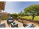 Inviting patio featuring comfortable seating and scenic views of the lush green surroundings at 9708 E Pampa Ave, Mesa, AZ 85212