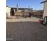 Backyard featuring a patio with shade, dining and grilling area, and gravel landscaping at 10951 N 91St Ave # 255, Peoria, AZ 85345
