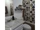 A clean bathroom with sink, toilet, bathtub with curtain and shelving for towels at 10951 N 91St Ave # 255, Peoria, AZ 85345