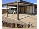 Covered carport and cozy home featuring low maintenance desert landscaping at 10951 N 91St Ave # 255, Peoria, AZ 85345