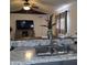 Features a granite countertop with stainless steel sink and bronze faucet at 10951 N 91St Ave # 255, Peoria, AZ 85345