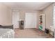 Spacious bedroom with sliding door closet, water cooler, and neutral tones for a relaxing atmosphere at 12375 W Meadowbrook Ave, Avondale, AZ 85392