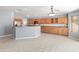 Spacious kitchen with ample storage, a center island, stainless steel appliances, and breakfast bar at 13630 W Redfield Rd, Surprise, AZ 85379